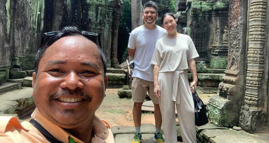 Travelers visit temple